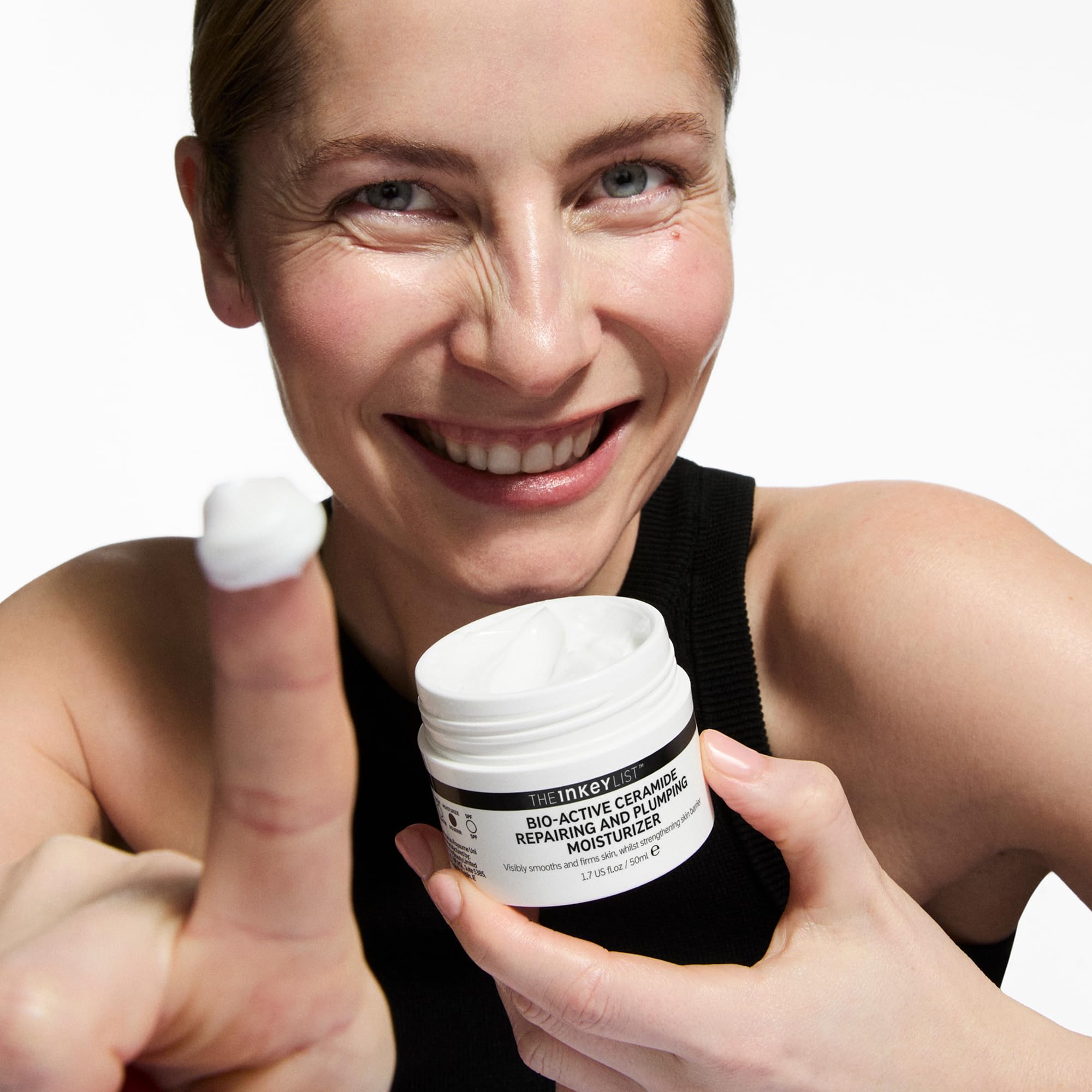 The INKEY List Bio-Active Ceramide Repairing and Plumping Moisturizer on hand for daily nourishment.