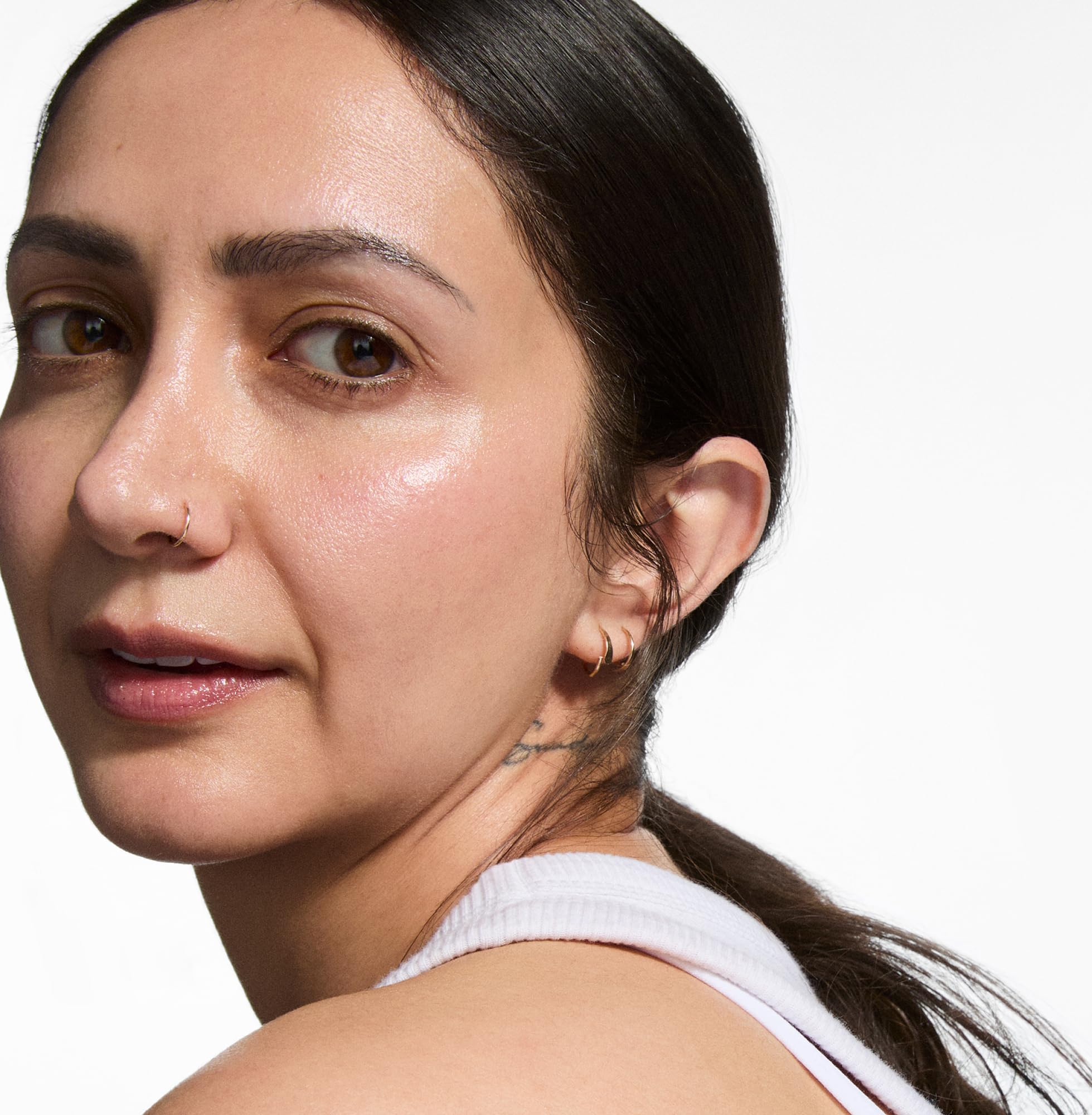 The INKEY List Collagen Peptide Serum on skin suggests smoother texture.