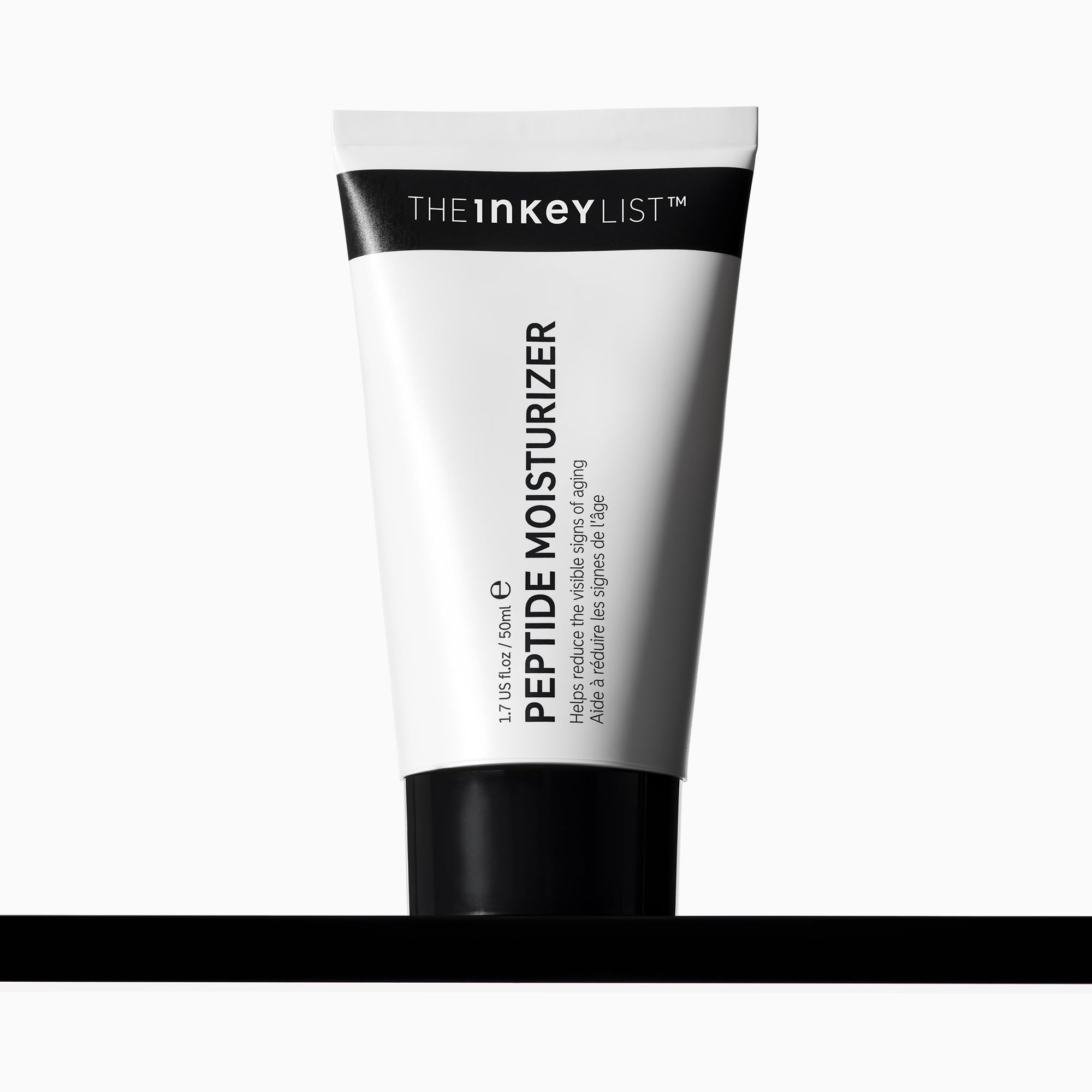 The INKEY List Peptide Moisturizer jar closeup demonstrates hydrating, dry-skin care.