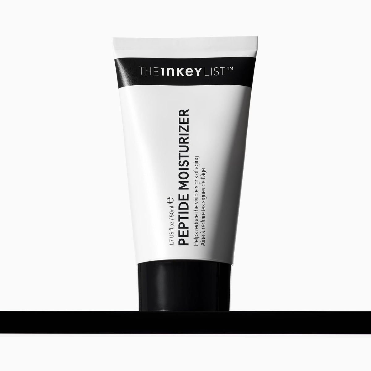 The INKEY List Peptide Moisturizer jar closeup demonstrates hydrating, dry-skin care.