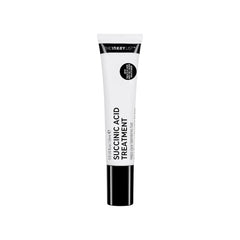 The INKEY List Succinic Acid Treatment bottle close-up showing targeted blemish care and oil reduction.