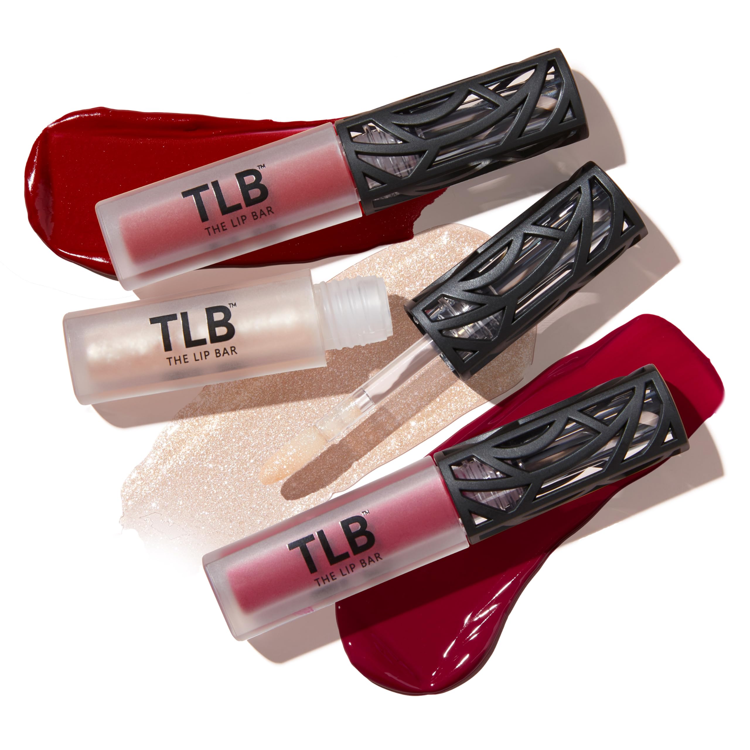 The Lip Bar Trophy Wife Gloss Up swatch reveals shimmering clear finish.