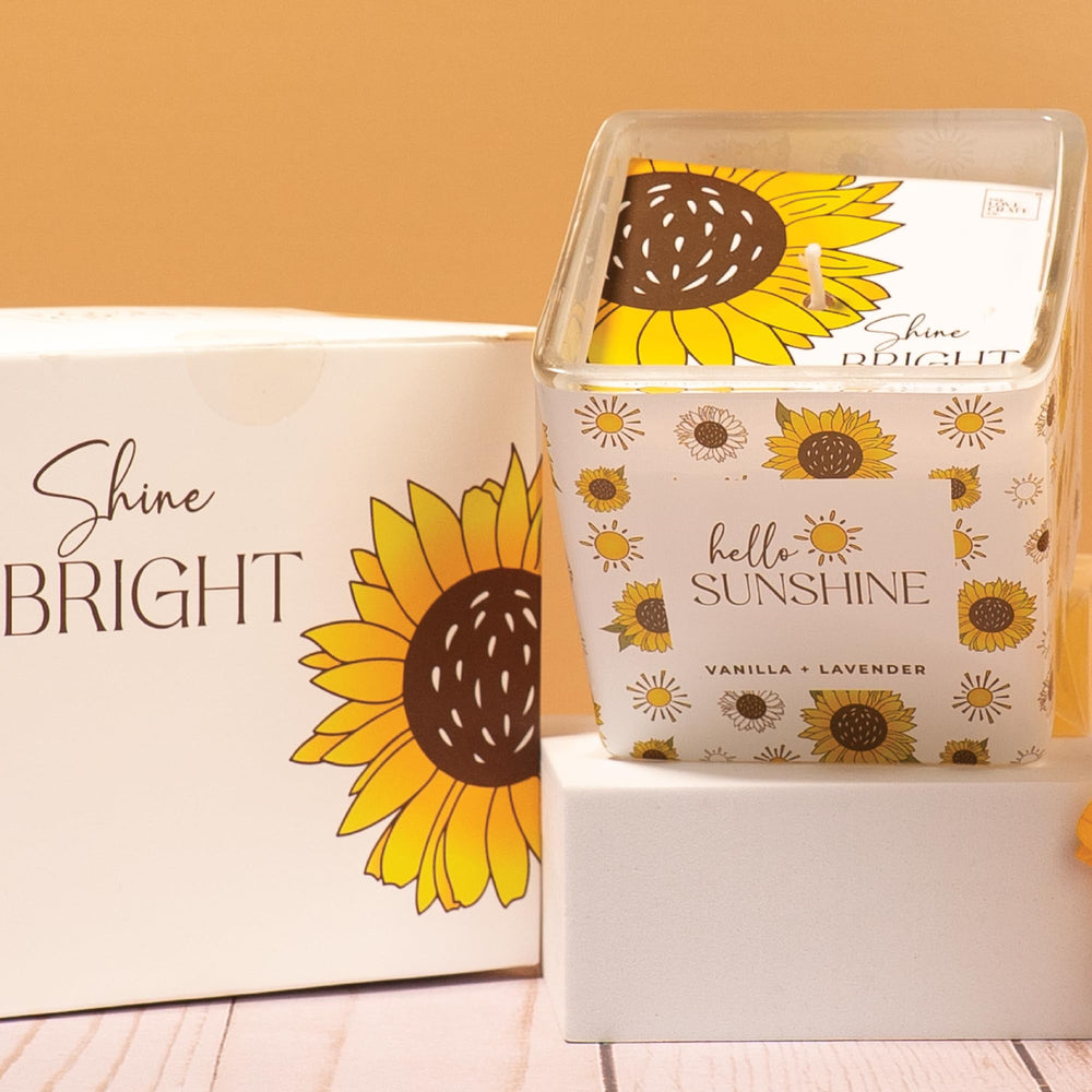 The Love Crate Co lavender soy wax candle creates soothing ambiance and scent.
