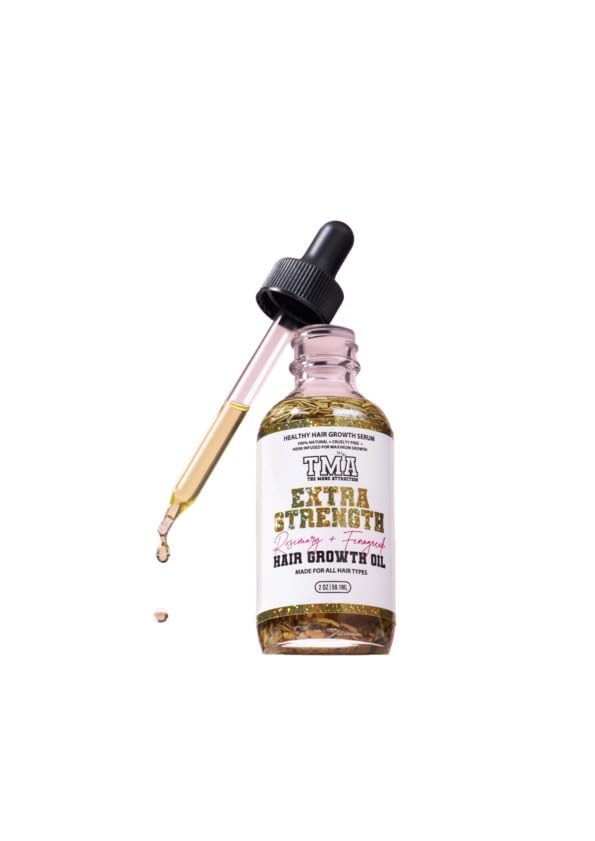 The Mane Attraction 2oz mini packaging sits ready for travel-friendly use.
