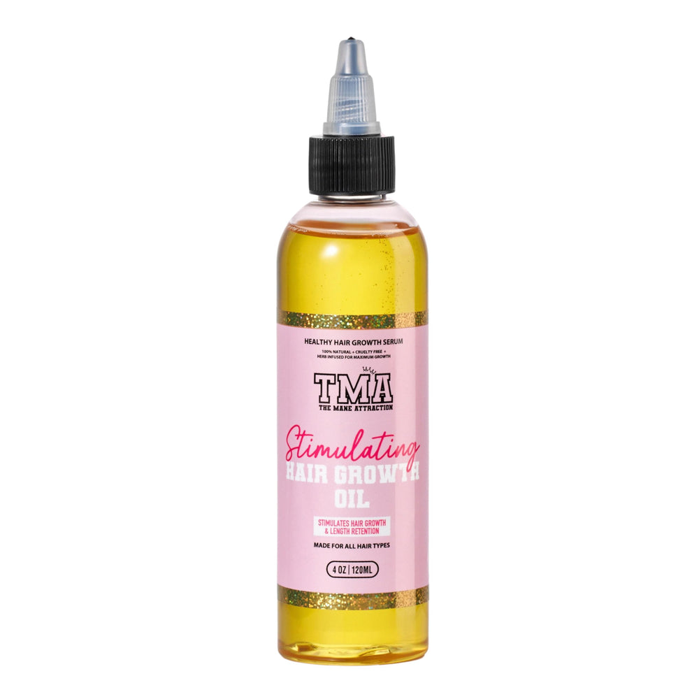 The Mane Attraction hair oil bottle pouring a lightweight formula for nourished roots