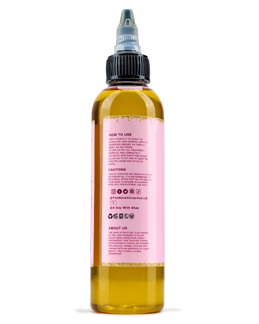 Hair with The Mane Attraction oil sealing moisture for textured hair