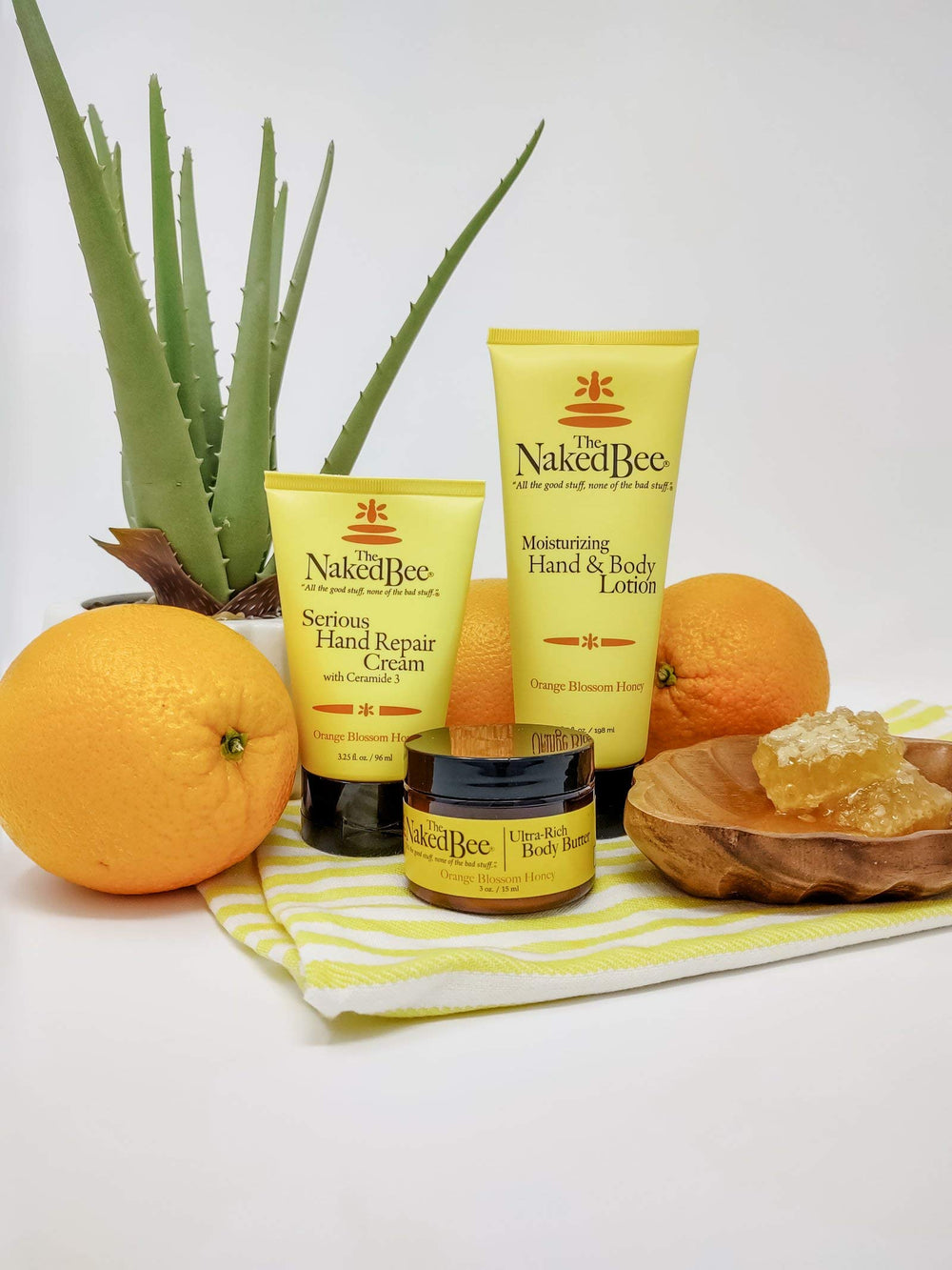 The Naked Bee Orange Blossom Hand Cream with shea butter nourishes and softens rough skin.