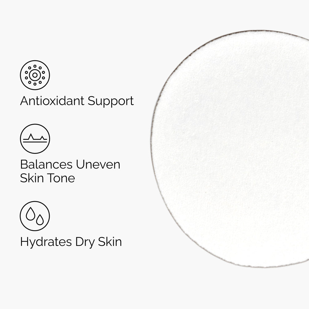The Ordinary bottle held in hand to show 1 fl oz scale and travel-friendly size benefit