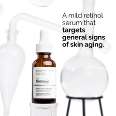 The Ordinary retinol dropper applying a drop to skin demonstrating controlled evening use