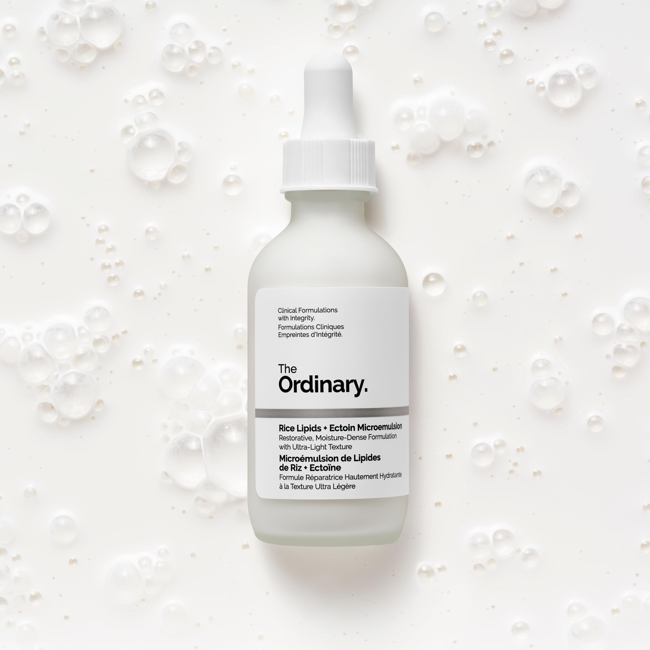 Foundation swatch over The Ordinary microemulsion showing smooth makeup base benefit