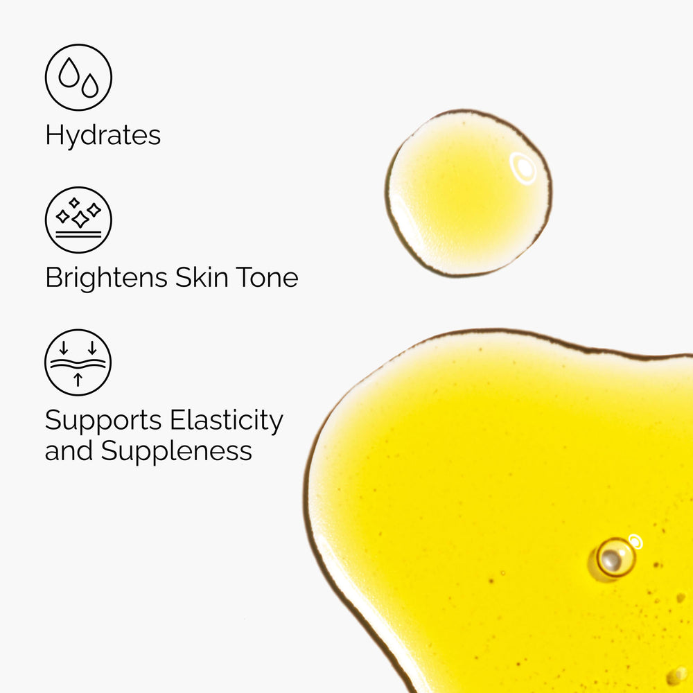 The Ordinary oil texture on fingertips highlighting smooth absorbency benefit
