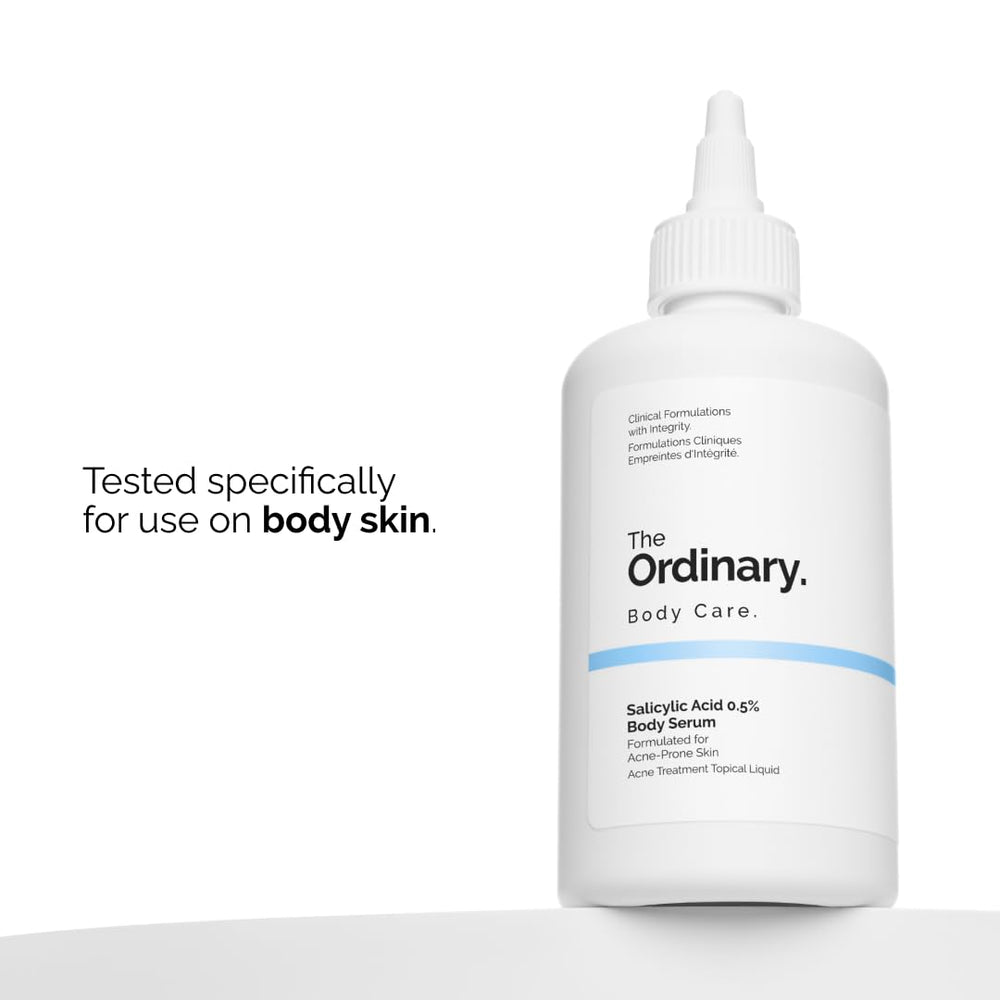 The Ordinary bottle held in hand showing 8.1 fl oz scale