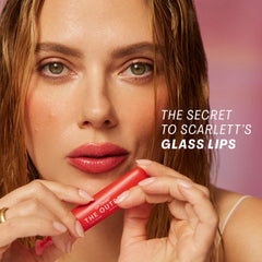 The Outset Lip Oasis Glossy Treatment application on lips delivers lasting shine.