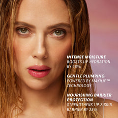 The Outset Lip Oasis Glossy Treatment on glossy lips shows hydrated, plump-looking shine.