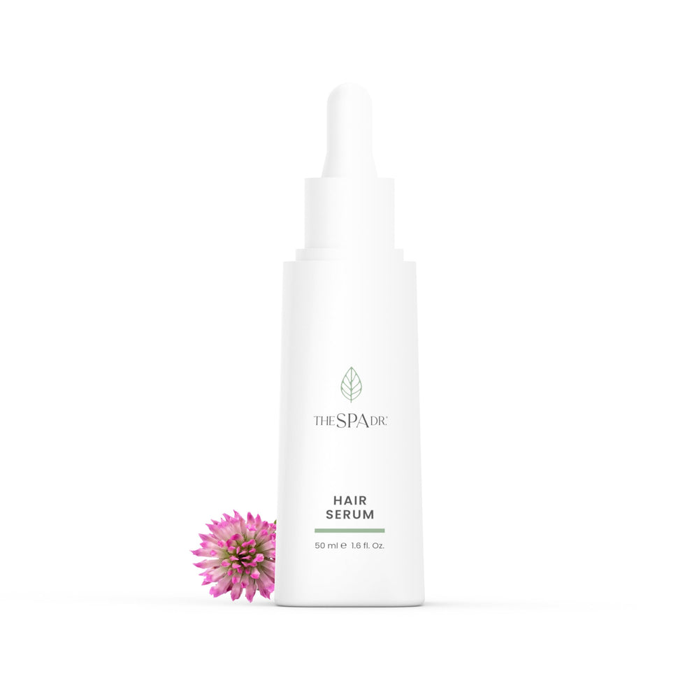 The Spa Dr. Hair Serum bottle applying to the scalp for hydration and a fuller look.