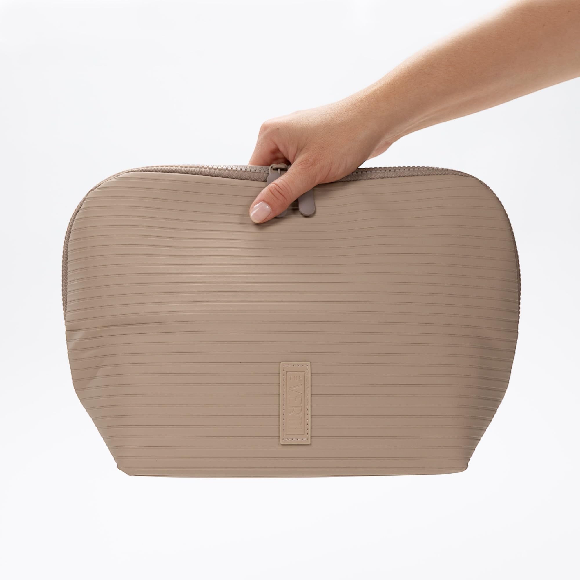 THE VERTI vanity-friendly sleek profile resting neatly on a counter