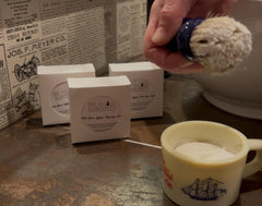The Village Soapsmith thick-lather image highlights rich foam for a lasting shave.