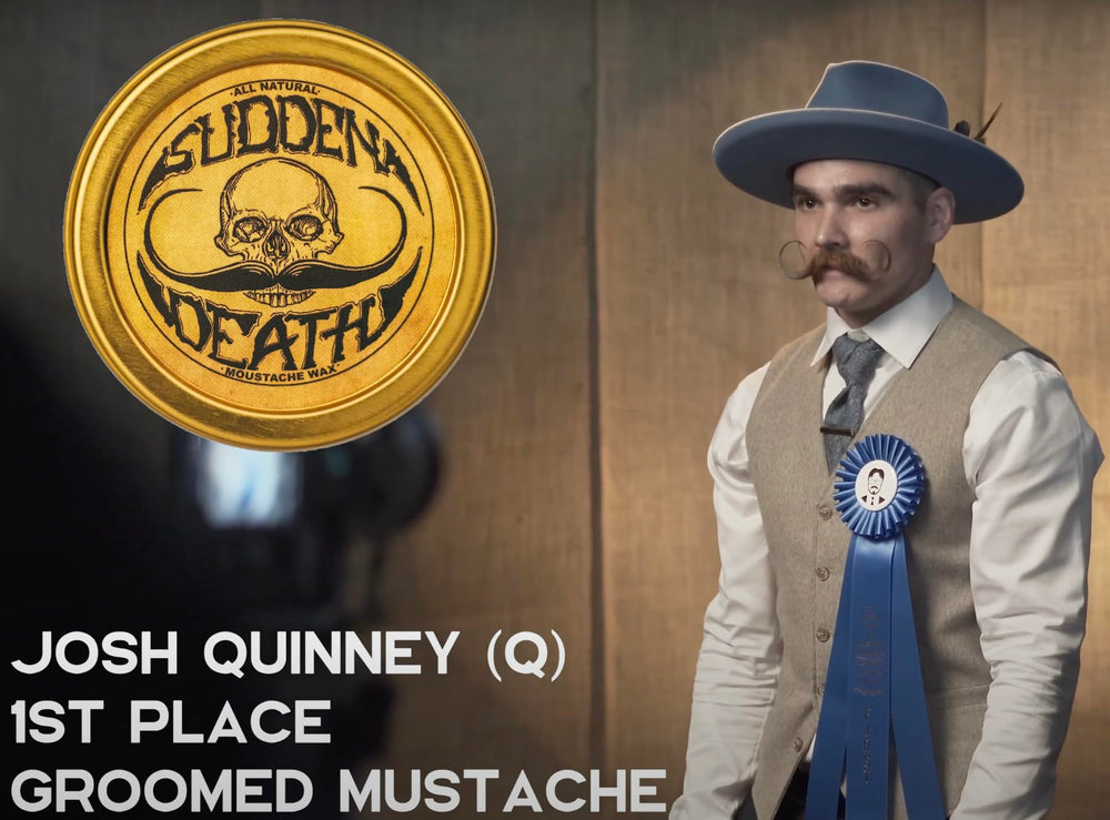 The Vintage Grooming Co moustache wax texture swatch reveals pliable hold.