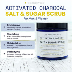 The Yellow Bird activated charcoal face scrub texture close-up shows gritty exfoliation.