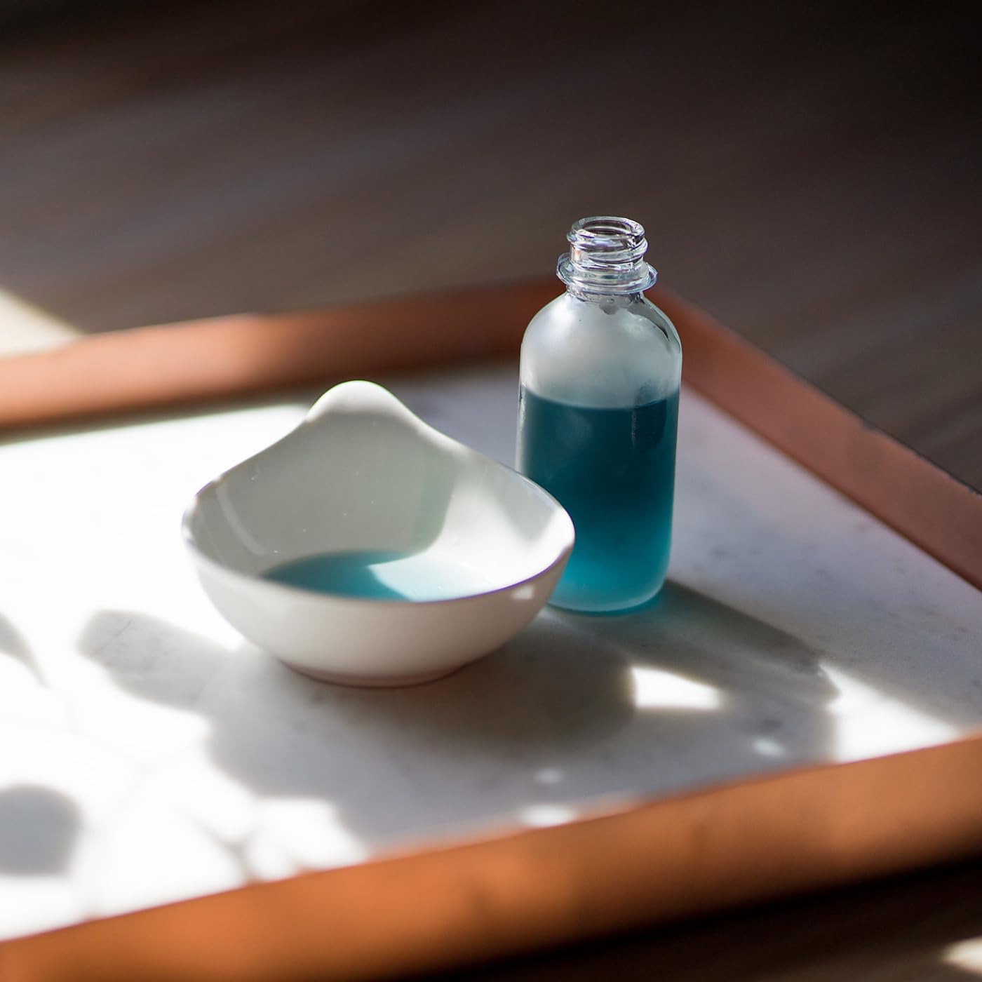 The Yellow Bird oil on skin shows radiant glow and improved texture.