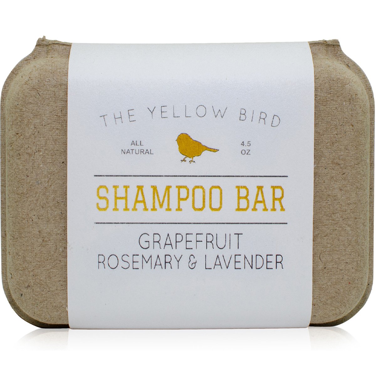 The Yellow Bird solid bar shampoo closeup shows grapefruit, rosemary and lavender aroma.