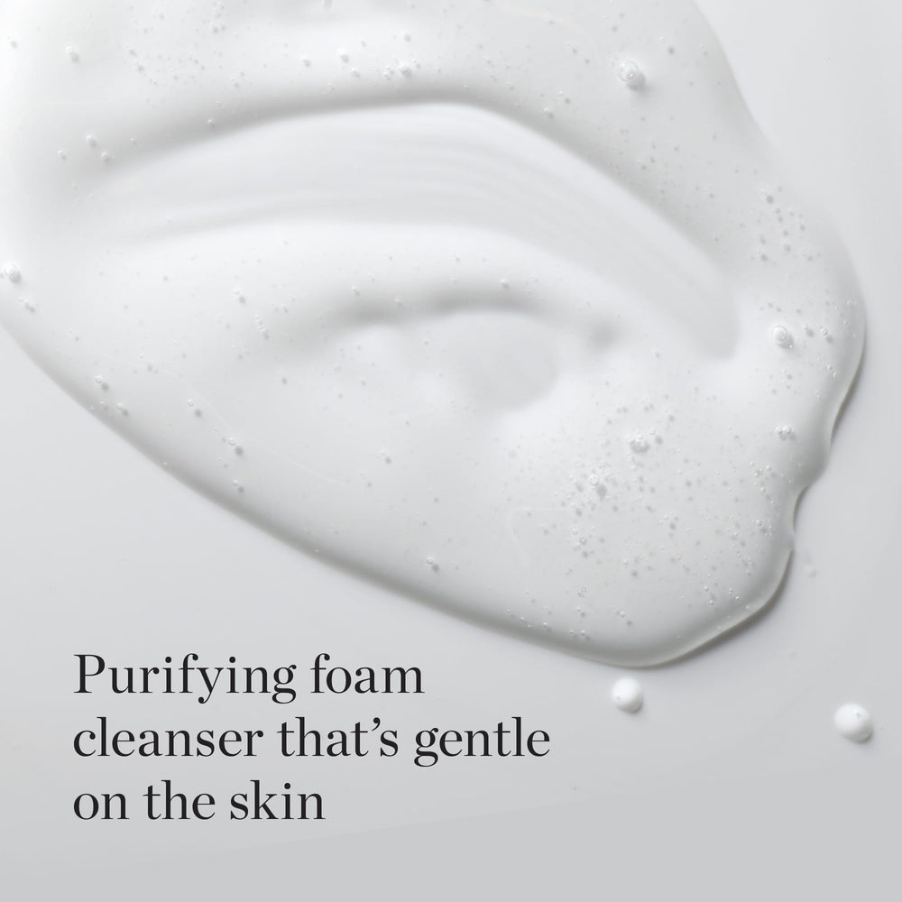 Foamy lather on hand demonstrating gentle cleansing from The Face Shop White Seed Exfoliating Cleansing Foam.