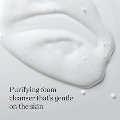 Foamy lather on hand demonstrating gentle cleansing from The Face Shop White Seed Exfoliating Cleansing Foam.
