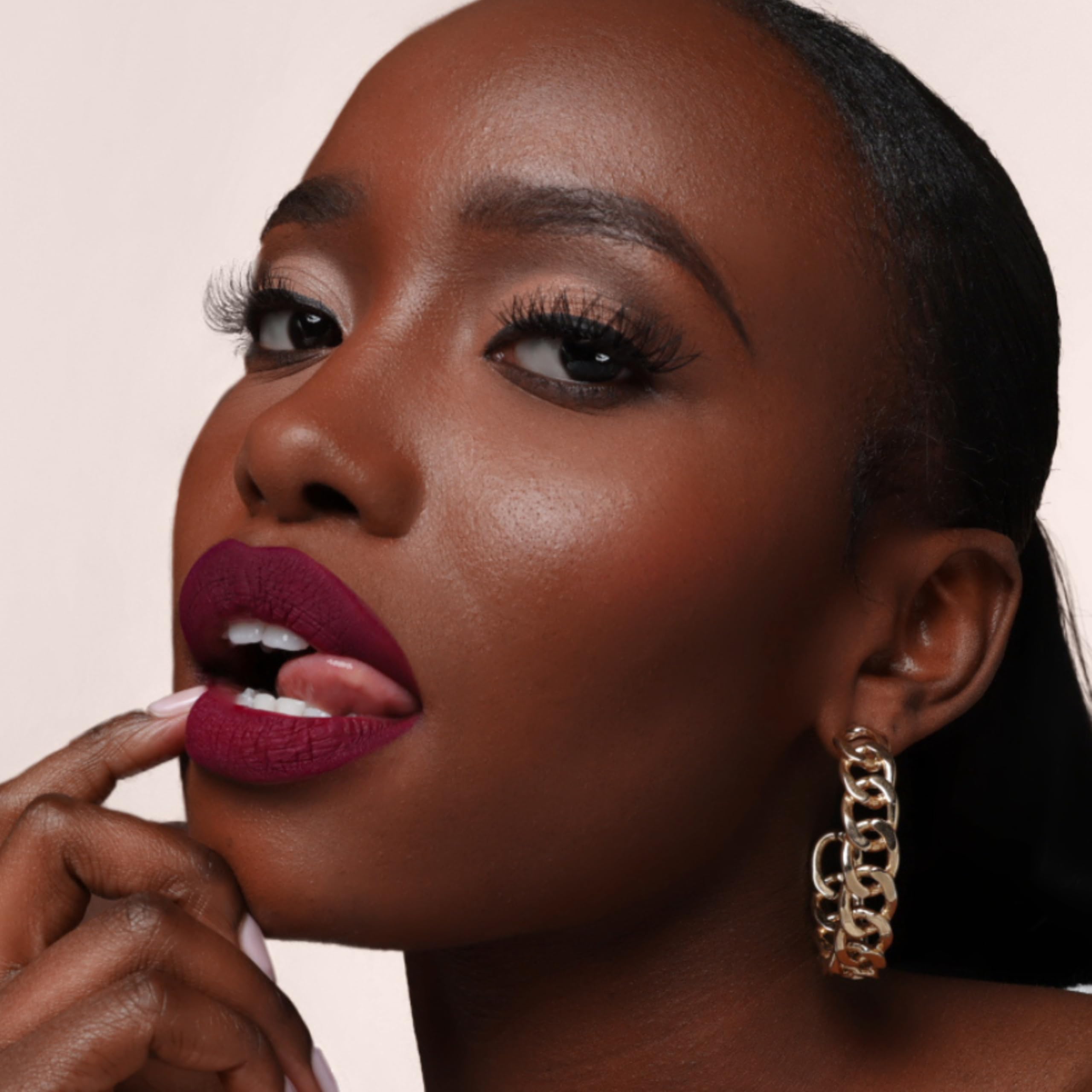 The Lip Bar Matte lipstick application closeup shows precise glide and even coverage.