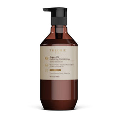 Theorie Argan Oil Ultimate Restoring Conditioner bottle delivering color-safe hydration and shine