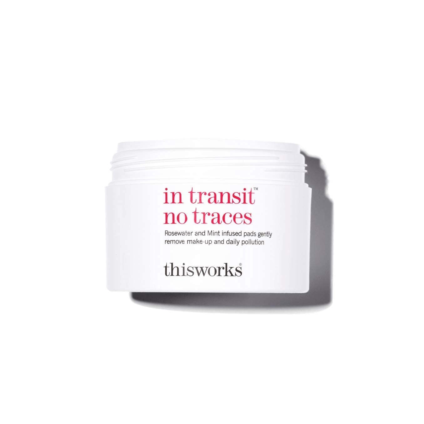 Closeup of THISWORKS pads shows rosewater-mint formula for gentle makeup removal.