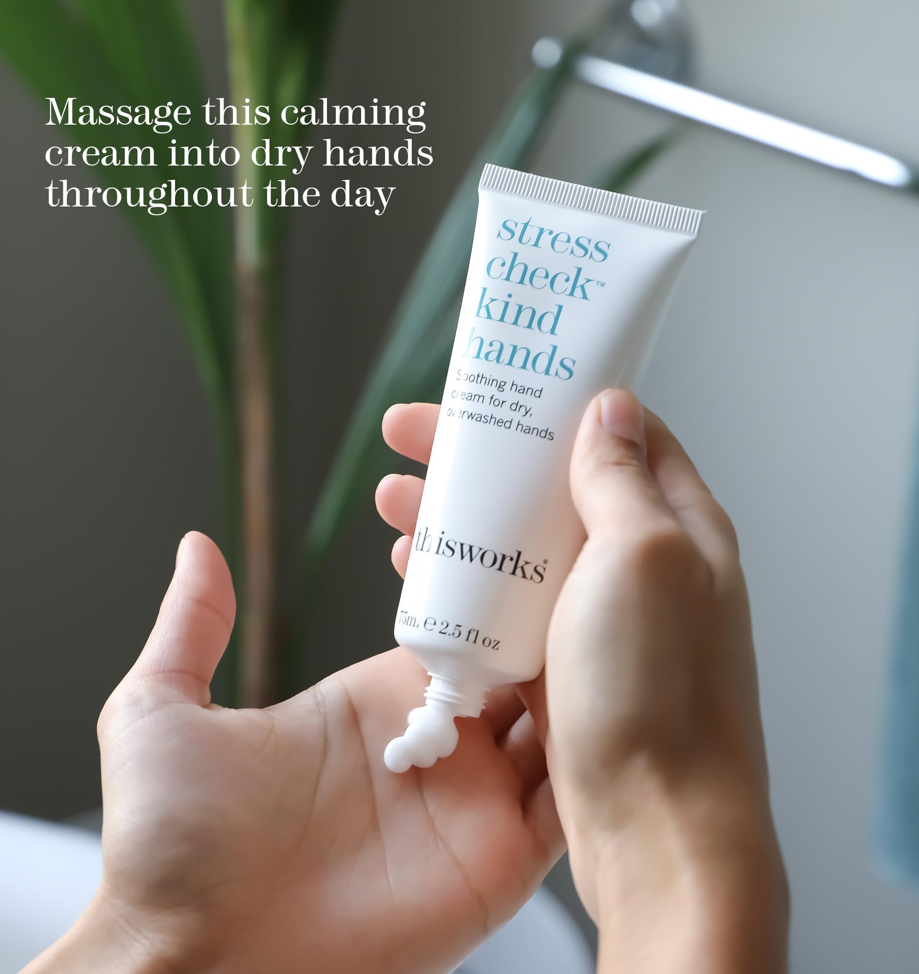THISWORKS Stress Check Kind Hands in use, soothing dry hands during the day.