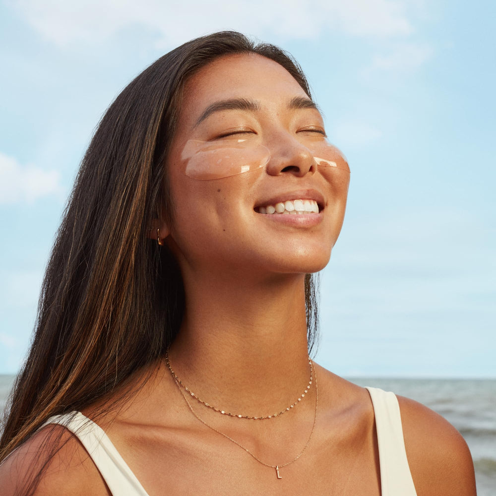Three Ships Brighter Days eye mask applied on skin demonstrates depuffing effect.