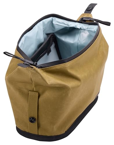 Thule Aion toiletry bag open pouch reveals TSA-friendly liquids compartment for quick security checks.