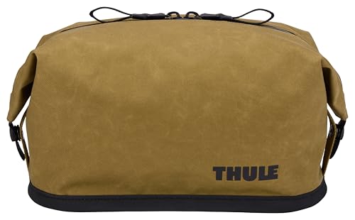 Thule Aion toiletry bag side view highlights expandability and side-flap versatility for more items.