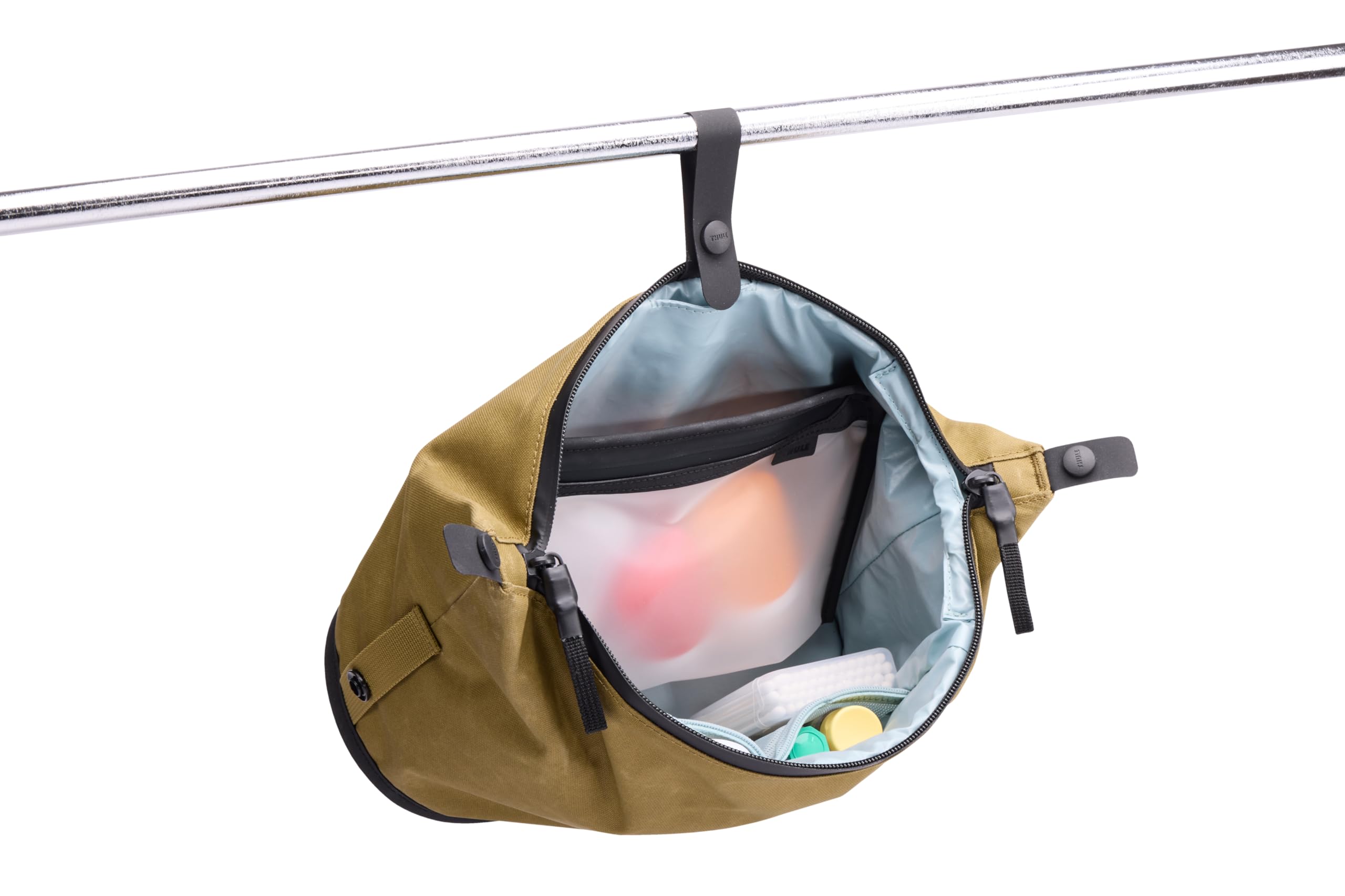Thule Aion stowed strap keeps the bag compact when inside luggage.