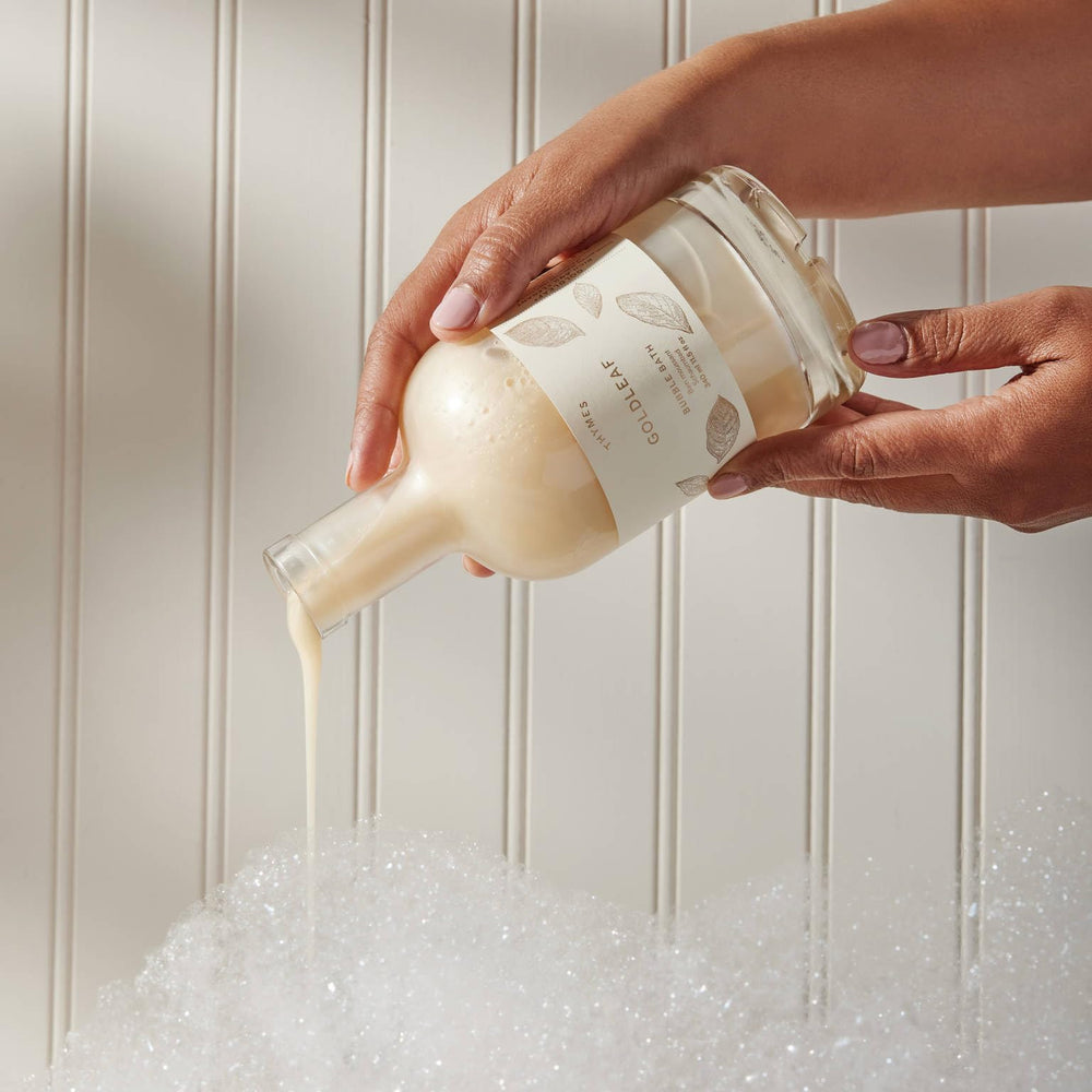 Thymes Bubble Bath Goldleaf creamy lather delivering a soothing, skin-nourishing soak.