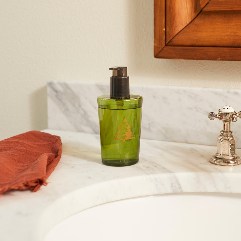 Thymes Frasier Fir closeup lather demonstrates creamy, moisturizing cleansing.