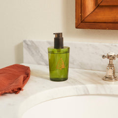 Thymes Frasier Fir closeup lather demonstrates creamy, moisturizing cleansing.
