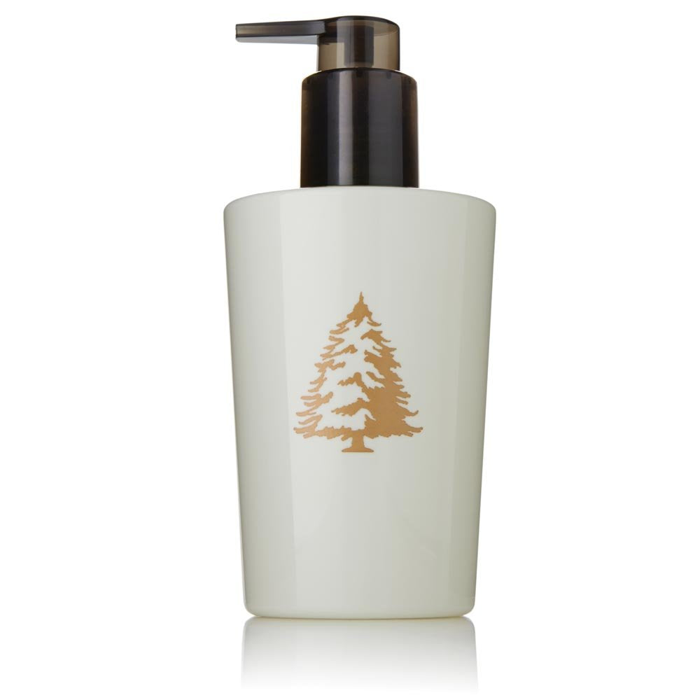 Thymes Frasier Fir hand lotion bottle showing crisp fragrance and moisturizing formula