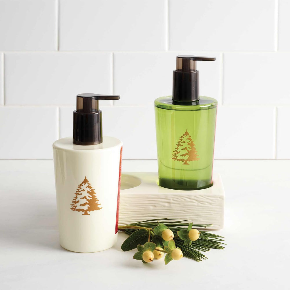 Thymes Frasier Fir hand lotion label closeup emphasizing artisanal design and ingredients