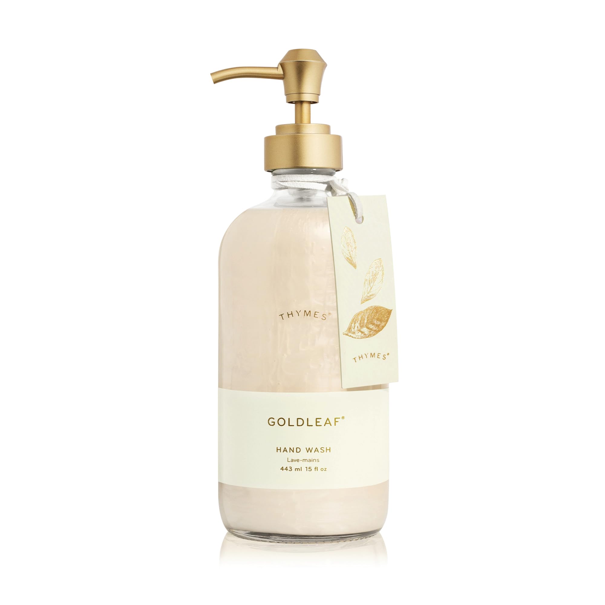 Thymes Goldleaf hand wash bottle on sink showing elegant glass design for daily use.