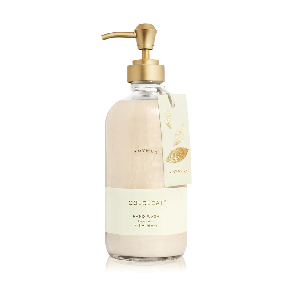 Thymes Goldleaf hand wash bottle on sink showing elegant glass design for daily use.