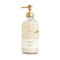 Thymes Goldleaf hand wash bottle on sink showing elegant glass design for daily use.