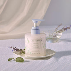Thymes hand lotion pump dispenses creamy hydration for dry hands.