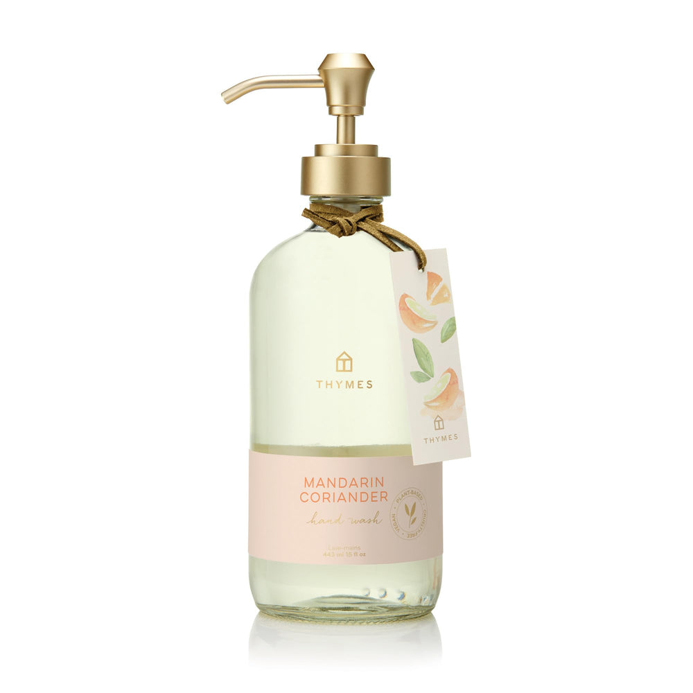 Thymes Hand Wash Mandarin Coriander bottle highlights refreshing herbal-citrus cleanse for daily use.