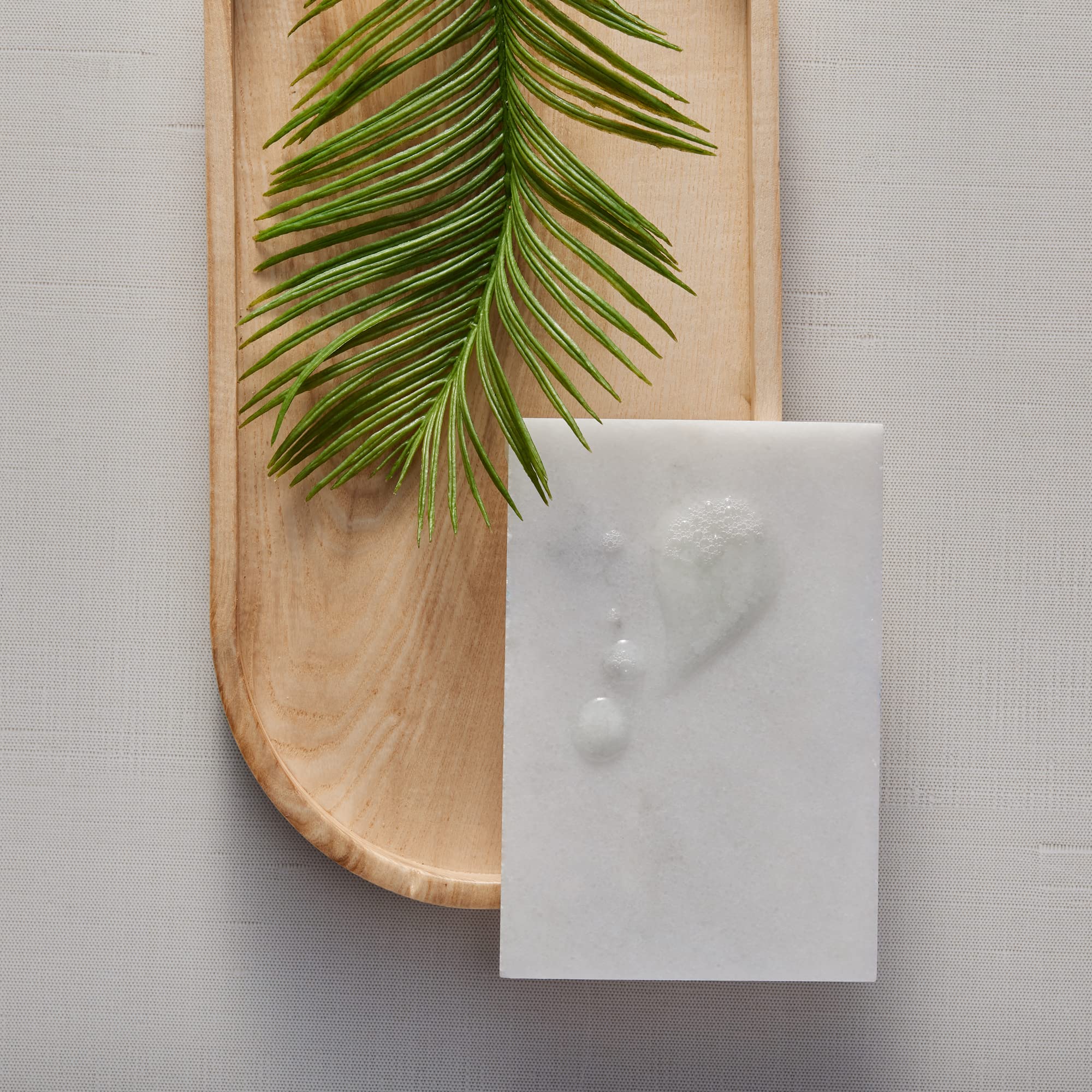 Thymes Hand Wash Mandarin Coriander cedarwood note image hints at a warm, comforting finish.