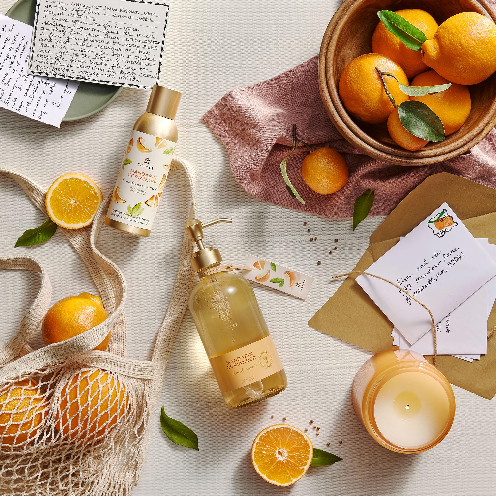 Thymes Hand Wash Mandarin Coriander lemon-balm focus image suggests calming herbal touch during hand washing.