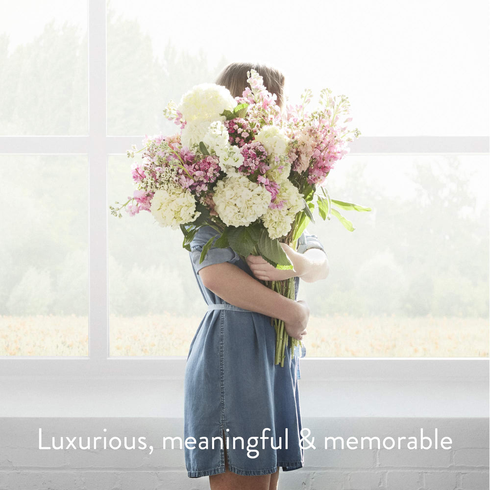 Thymes Kimono Rose fragrance notes including jasmine and clementine evoke spa-like mood.