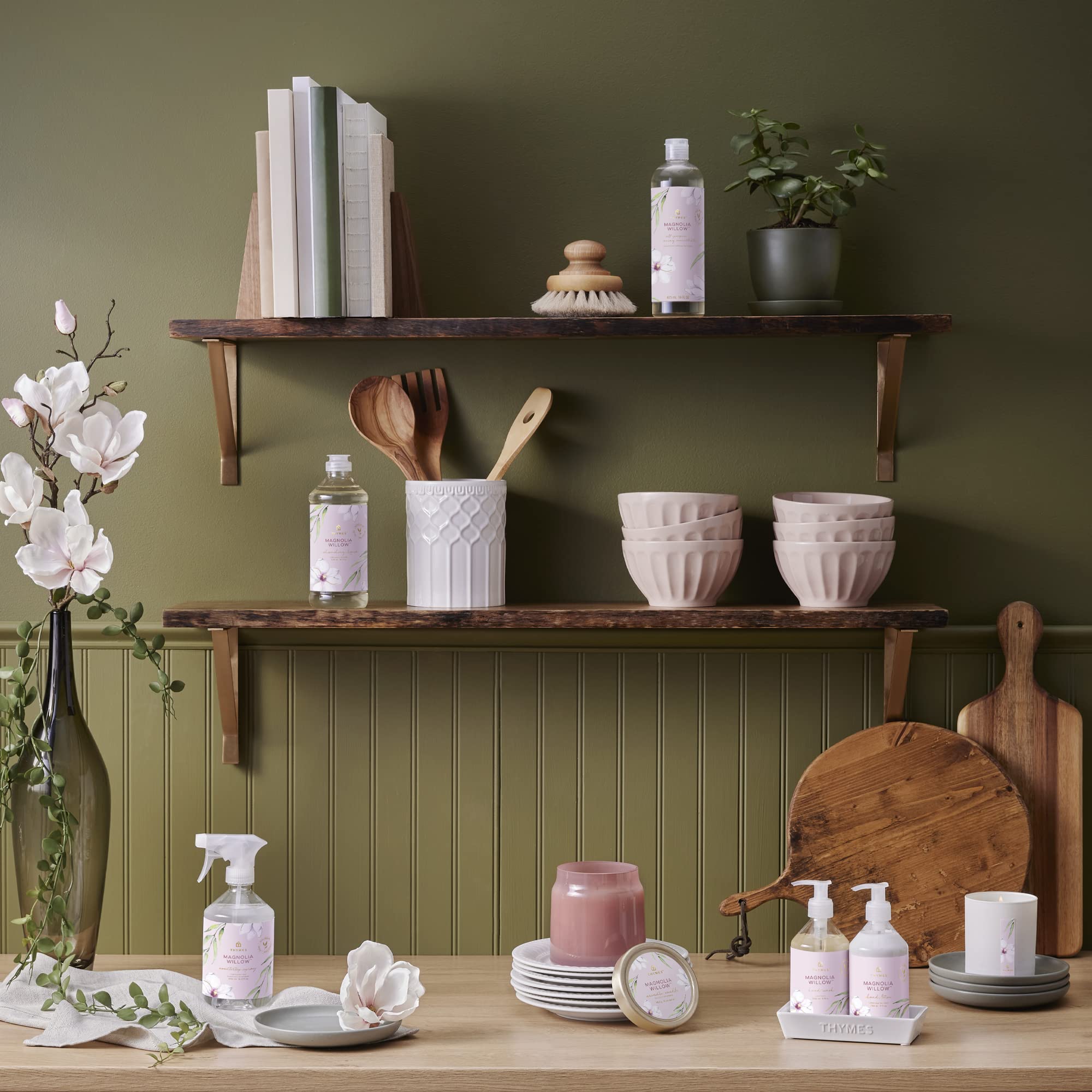 Thymes Magnolia Willow lotion in use shows quick, non-greasy absorption for moisturized hands.