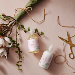 Thymes shea butter jar close-up highlights rich hydration for nourished skin.